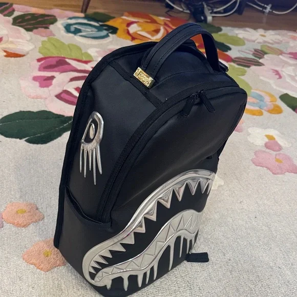 Sprayground limited edition Black Backpack with Silver Shark Design